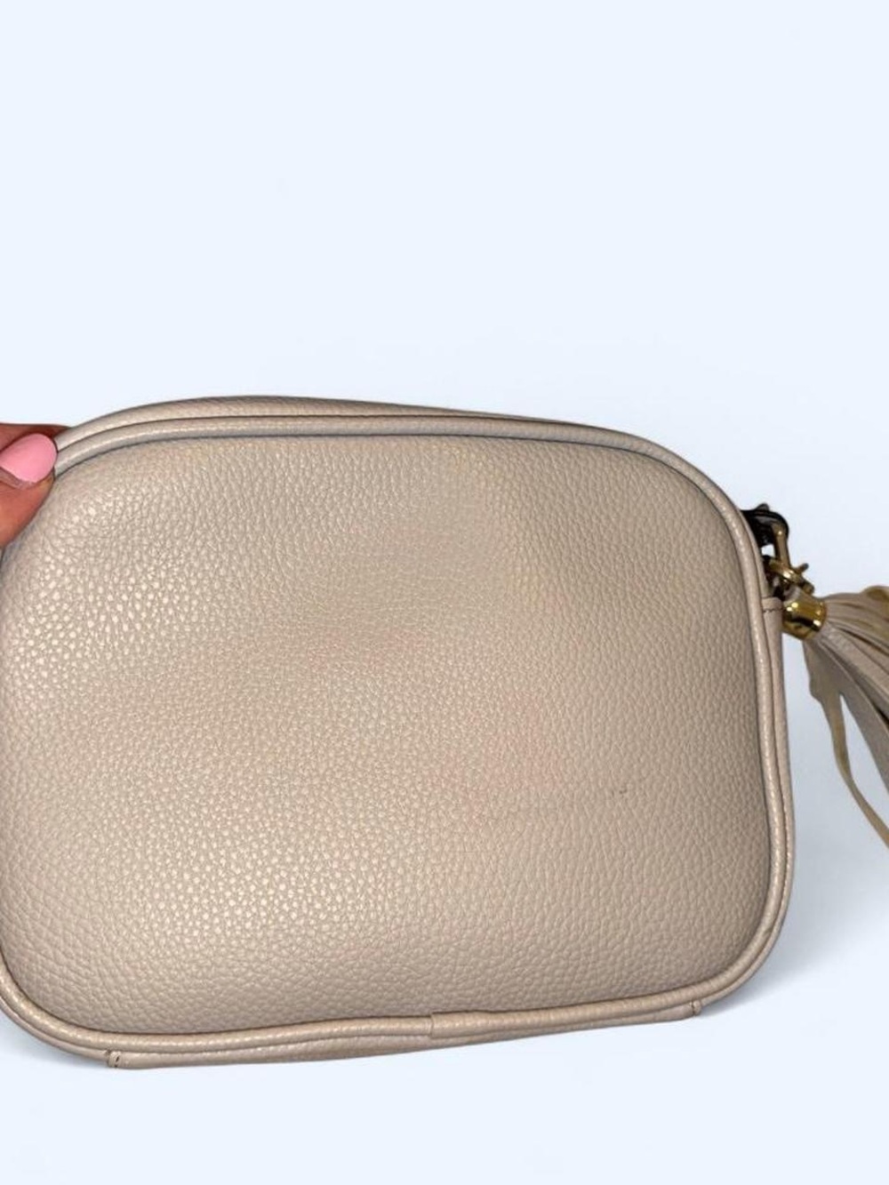 Kate and Alex Pebbled Faux Leather Crossbody with Tassel in Light Beige